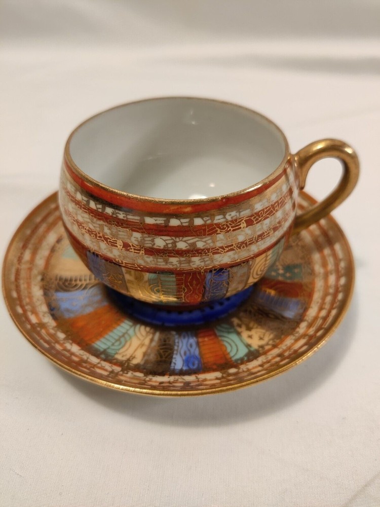 Hand painted Japan Demitasse Cup and Saucer Set Colorful Thousand Eyes faces VTG